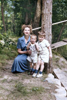 http://leighlarson.com/JPG%20Final%20Reed%20and%20Leigh%20by%20Boathouse%20Tree%20ca.%201945.jpg