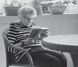 KEEPING BUSY&mdash;Among the daily activities 107-year-old Marion Benson enjoys at University Village are reading mystery novels, playing bridge, assembling puzzles and dining with friends. 
DIANNE AVERY/Acorn Newspapers 